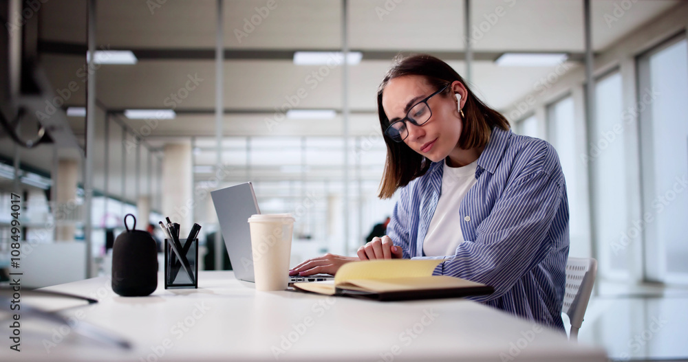 Focused Woman Utilizing Digital Tools For Online Education In Office - Student Focused Woman Utilizing Digital Tools For Online Education In Office - Student