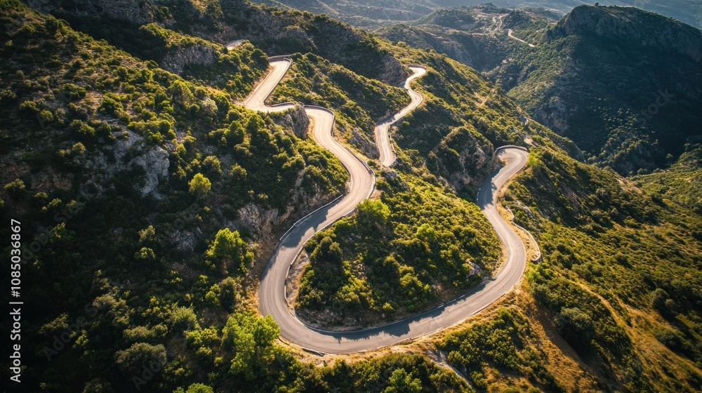 Winding Road Through Lush Green Mountainside Winding Road Through Lush Green Mountainside