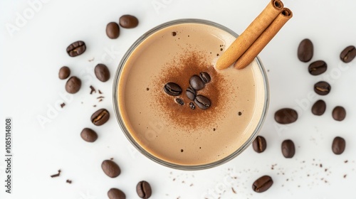 Wallpaper Mural Glass of carajillo cocktail decorated with coffee beans and cinnamon sticks on white background Torontodigital.ca