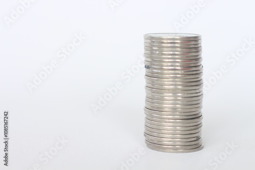 Stack of silver coins isolated on white background. Coin tower. 1000 National currency. Money concept, metal money