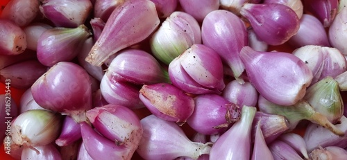 Peeled of fresh red onions Sumenep or bawang merah Sumenep background Indonesia. Ready to cooked