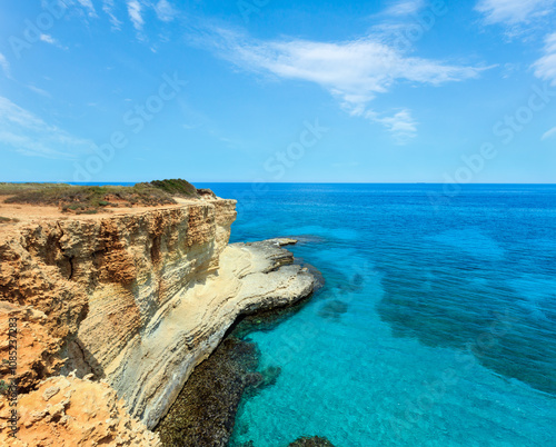 Picturesque seascape with cliffs and clear water, at Torre Sant Andrea, Salento sea coast, Puglia, Italy