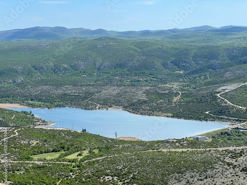 Accumulation lake Razovac or the lower artificial lake of the reversible hydroelectric power plant Velebit (Muškovci, Croatia) - Akumulacijsko jezero Razovac ili donje umjetno jezero RHE Velebit photo