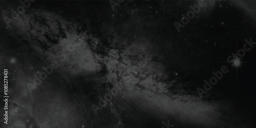 Enigmatic universe captured in shades of black and gray highlighting smoky nebulae interwoven with twinkling stars
