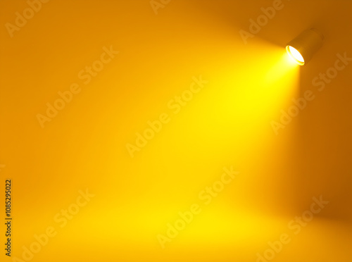 A yellow background with a spotlight on the right side, creating an atmosphere for film and television production or photography studio advertising.