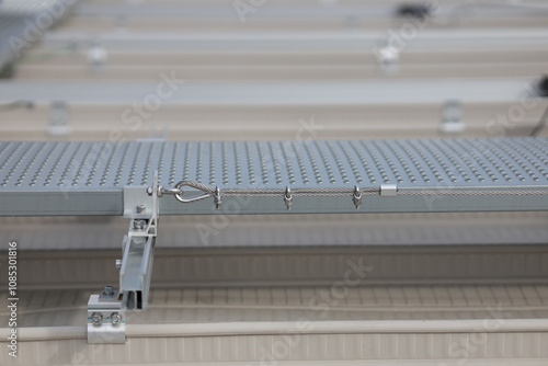 Lifeline system installed on the side of walkway. Lifeline systems are installed to work at heights and prevent falls from heights.