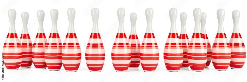 Group of bowling pins skittles with red stripes isolated on white background, sport, white background Group of bowling pins skittles with red stripes isolated on white background, sport, white background
