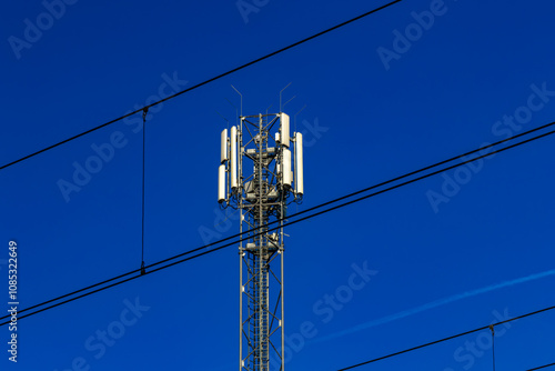 A tall mast with devices for transmitting television and mobile telephony signals in 5G technology