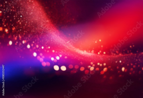 A red, sparkling wave against a black background.