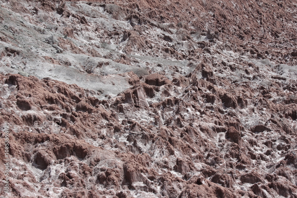 Expansive desert terrain with rocky ground and sparse vegetation, illustrating the harsh beauty of arid landscapes. Expansive desert terrain with rocky ground and sparse vegetation, illustrating the harsh beauty of arid landscapes.