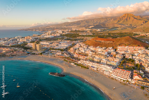 Obraz na płótnie Aerial view of Playa de las Americas beach at sunset, Tenerife, Spain. w salonie