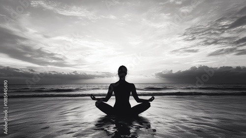 Wallpaper Mural silhouette of a person in yoga position on a beach in the evening in black and white shot Torontodigital.ca