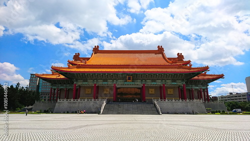 Taipei, Taiwan - 07.16.2017: Facade of the National Concert Hall at Liberty Square on the north of Chiang Kai-shek Memorial Square under a sunny blue sky with clouds photo