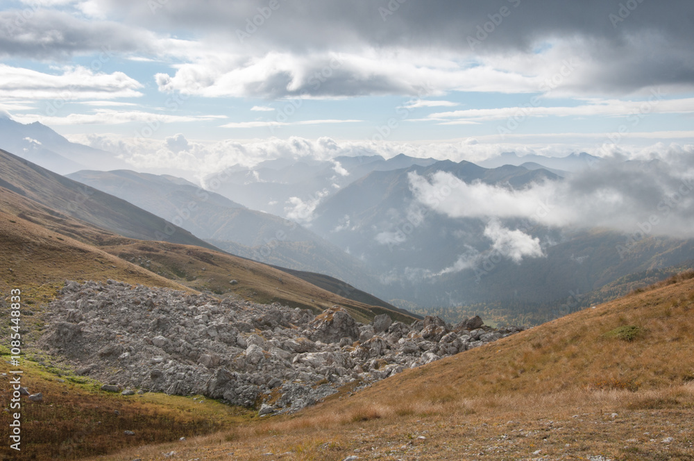 Landscape view of Caucasus mountains seen from the top of mountain ridge, Republic of Adygea, Russia Landscape view of Caucasus mountains seen from the top of mountain ridge, Republic of Adygea, Russia