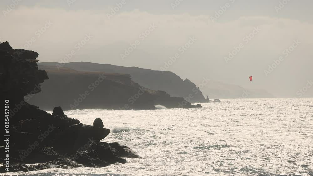 Rocky coastline of Fuerteventura on cloudy weather. Rocky coastline of Fuerteventura on cloudy weather.