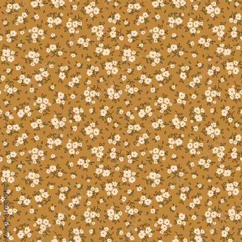 Elegant floral pattern in small hand draw flowers. Liberty style. White flowers, gold background. Floral seamless background for fashion prints. Vintage print. Seamless vector texture. Spring print