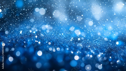 Abstract background of snow and falling snowflake particle bokeh blur