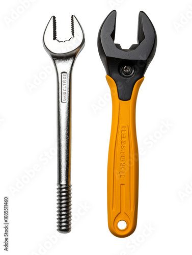 Two wrenches, one metallic and one with yellow handle, are displayed side by side. metallic wrench has open end design, while yellow handled wrench is adjustable. Both tools are essential for photo