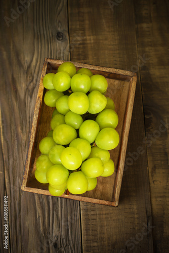 grapes in a wooden bowl