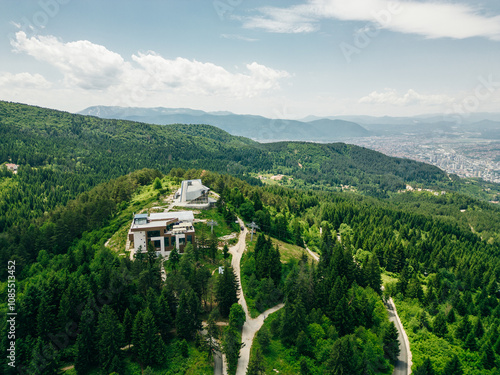 A captivating aerial view of Sarajevo's cityscape nestled amidst the scenic hills of Bosnia and Herzegovina. photo