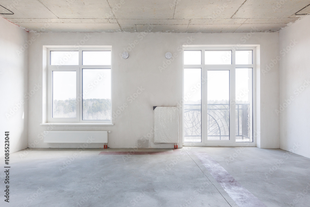 interior of the apartment without decoration in gray colors. rough finish interior of the apartment without decoration in gray colors. rough finish