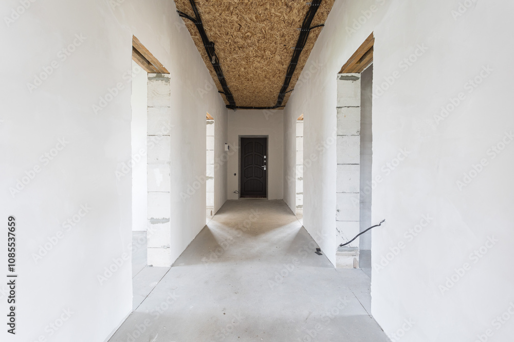 interior of the apartment without decoration in gray colors. rough finish interior of the apartment without decoration in gray colors. rough finish