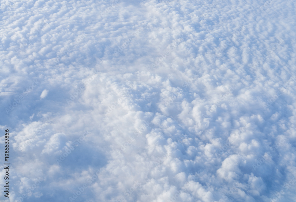 Above soft clouds at sunset copy space, background Above soft clouds at sunset copy space, background