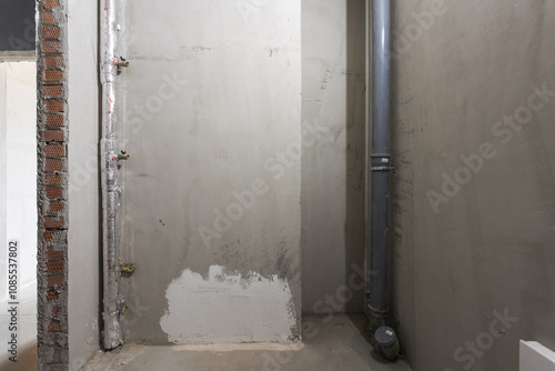 interior of the apartment without decoration in gray colors. rough finish