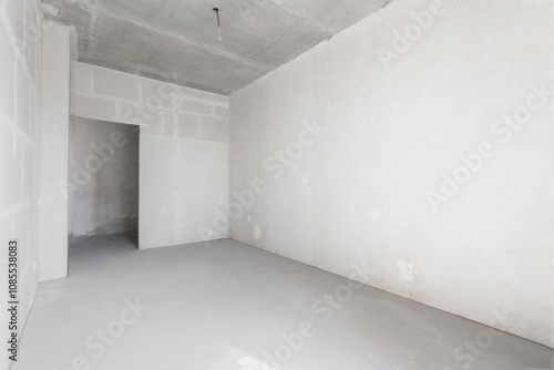 interior of the apartment without decoration in gray colors. rough finish