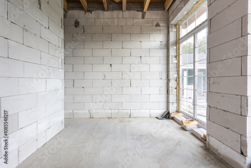 interior of the apartment without decoration in gray colors. rough finish