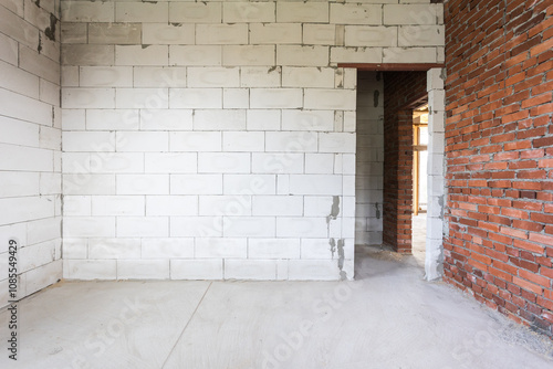 interior of the apartment without decoration in gray colors. rough finish