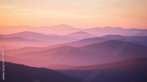 Serene Sunrise Over Mountain Range with Soft Light