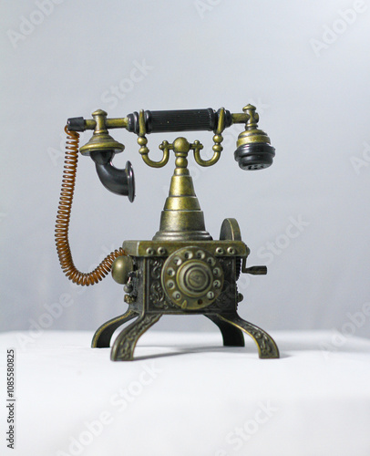 old fashioned tustic vintage telephone on the table photo