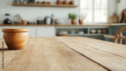 Wallpaper Mural A cozy kitchen scene featuring a wooden table with a rustic bowl, emphasizing warmth and homey decor. Torontodigital.ca