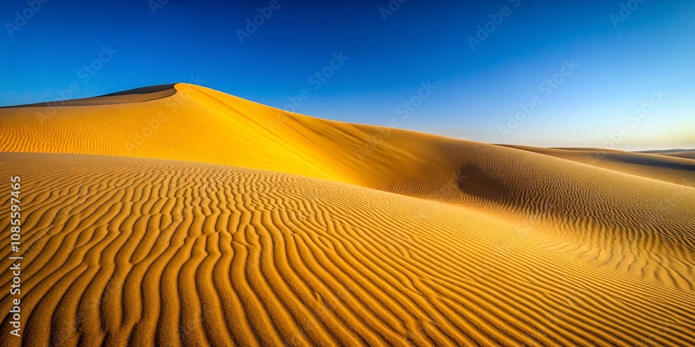 Naklejka premium The Golden Sand Dunes of a Desert Landscape, a Visually Stunning and Texturally Rich Background for Design Projects