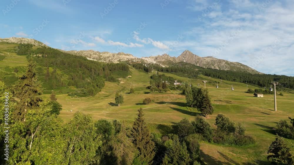 Sunlit mountain landscape, cable cars, forest, alpine village, serene atmosphere Sunlit mountain landscape, cable cars, forest, alpine village, serene atmosphere