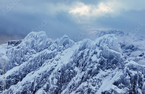 Wallpaper Mural Majestic SnowCapped Mountains Are Set Beautifully Against A Dramatic And Captivating Sky Torontodigital.ca