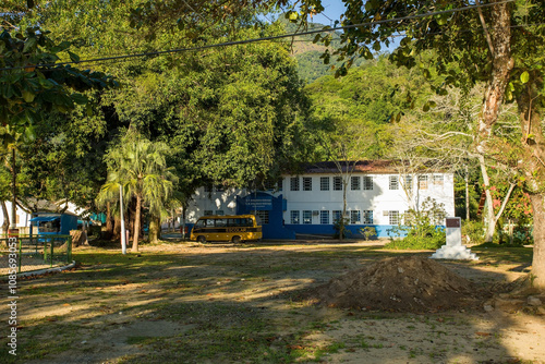 School and school bus on Big Island, Agra dos Reis city, Brazil photo