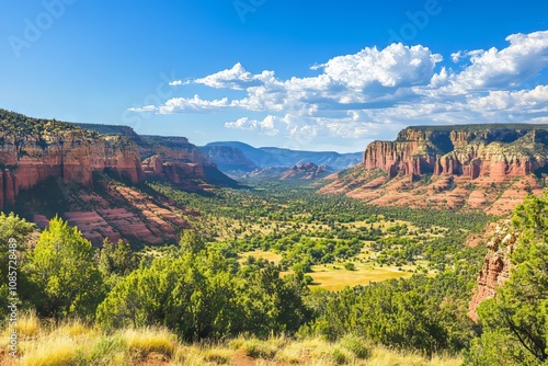 Breathtaking sedona landscape with red rock formations and angel s window under clear blue sky photo