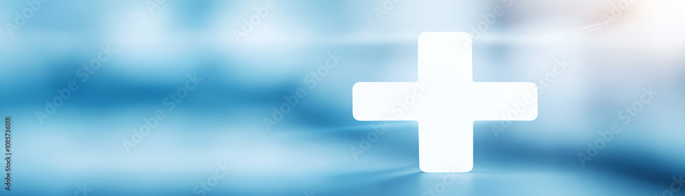 Medical cross symbol on soft blue background representing healthcare and medical services. Medical cross symbol on soft blue background representing healthcare and medical services.