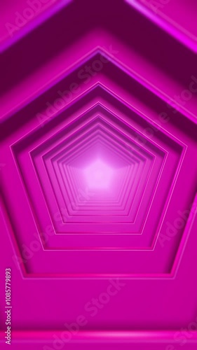 Travelling down an endless bright pink tunnel of ever expanding shapes. photo