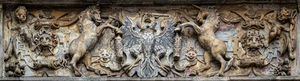 Medieval stone panel with unicorns and royal coat of arms Medieval stone panel with unicorns and royal coat of arms