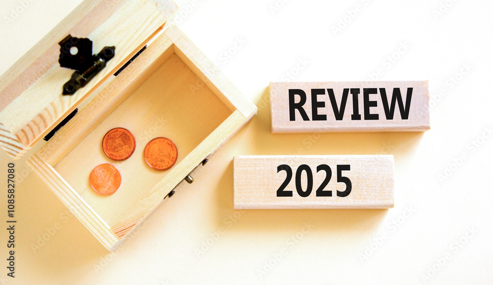 Planning review 2025 new year symbol. Concept words Review 2025 on beautiful wooden blocks. Beautiful white background. Wooden chest with coins. Business review 2025 new year concept. Copy space. Planning review 2025 new year symbol. Concept words Review 2025 on beautiful wooden blocks. Beautiful white background. Wooden chest with coins. Business review 2025 new year concept. Copy space.