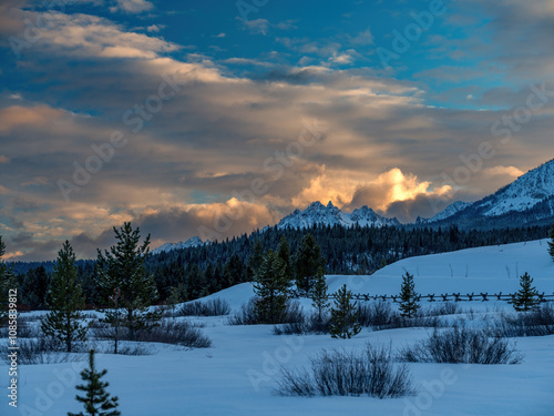 Dramatic clouds over Sawtooth mountain at sunset photo