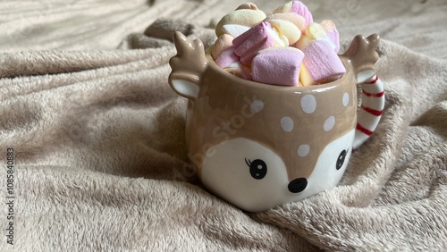 hot chocolate with marshmallows in the shape of a Christmas deer photo