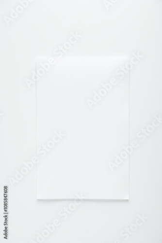 paper sheet lies isolated plain white background