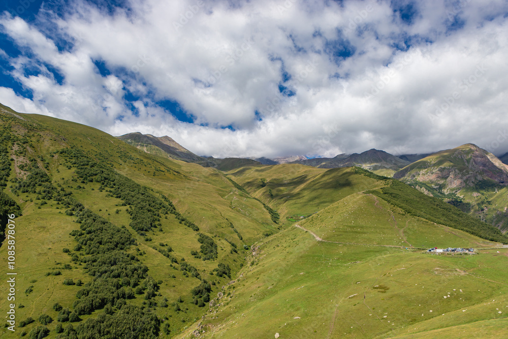 Caucasian mountains near Gergeti village, Stepansminda. Kazbegi mountain behind the clouds. Georgia