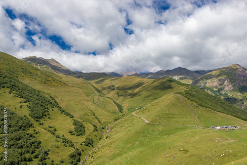 Obraz na płótnie Caucasian mountains near Gergeti village, Stepansminda. Kazbegi mountain behind the clouds. Georgia w salonie