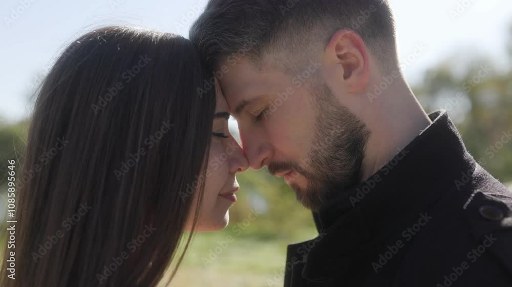 Loving Couple in Peaceful Autumn Setting, Enjoying a Quiet Embrace Loving Couple in Peaceful Autumn Setting, Enjoying a Quiet Embrace