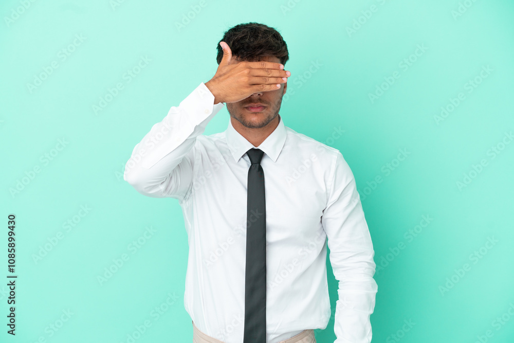 Business caucasian man isolated on blue background covering eyes by hands. Do not want to see something Business caucasian man isolated on blue background covering eyes by hands. Do not want to see something